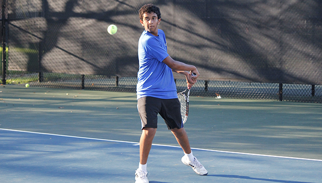 North VS East tennis match happens today at home. It will start at 5p.m. Anay Gangal focuses on a backhand.